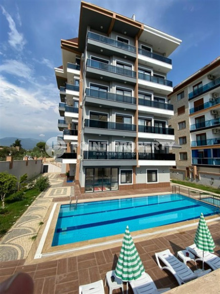 Меблированная двухкомнатная квартира 1+1, в новой резиденции в 250м от моря в районе Кестель, Алания-id-1662-фото-18