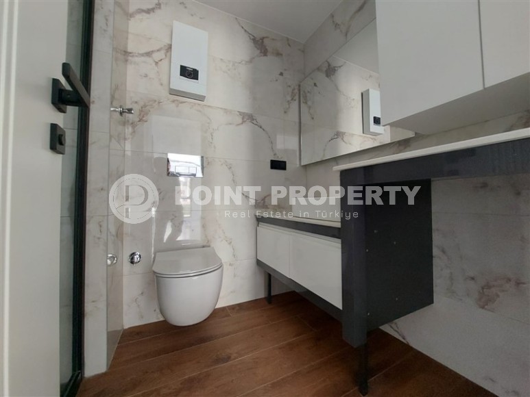 Квартира 1+1 в новом доме в центре Алании-id-8432-фото-8