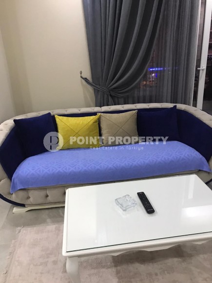 Две квартиры 1+1 на разных этажах в новом доме района Махмутлар-id-8435-фото-2