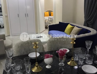 Две квартиры 1+1 на разных этажах в новом доме района Махмутлар-id-8435-фото-3