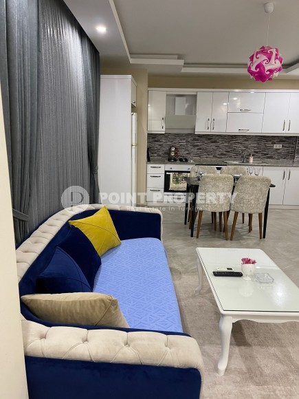 Две квартиры 1+1 на разных этажах в новом доме района Махмутлар-id-8435-фото-4