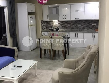 Две квартиры 1+1 на разных этажах в новом доме района Махмутлар-id-8435-фото-5