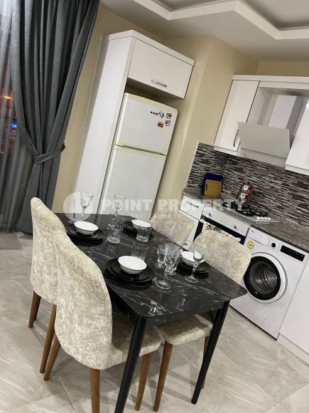 Две квартиры 1+1 на разных этажах в новом доме района Махмутлар-id-8435-фото-6