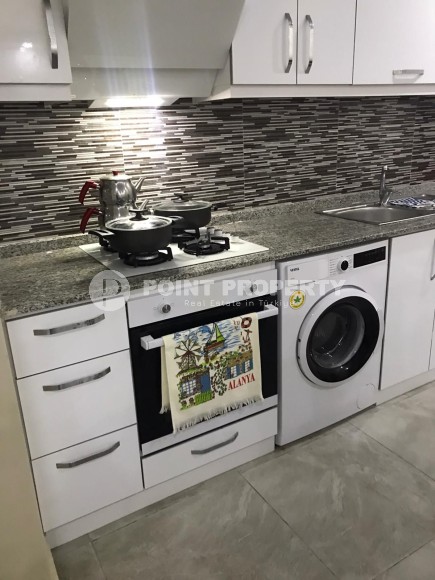 Две квартиры 1+1 на разных этажах в новом доме района Махмутлар-id-8435-фото-8