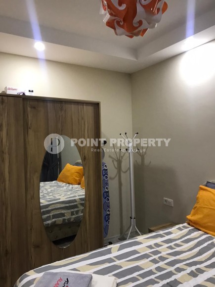 Две квартиры 1+1 на разных этажах в новом доме района Махмутлар-id-8435-фото-9