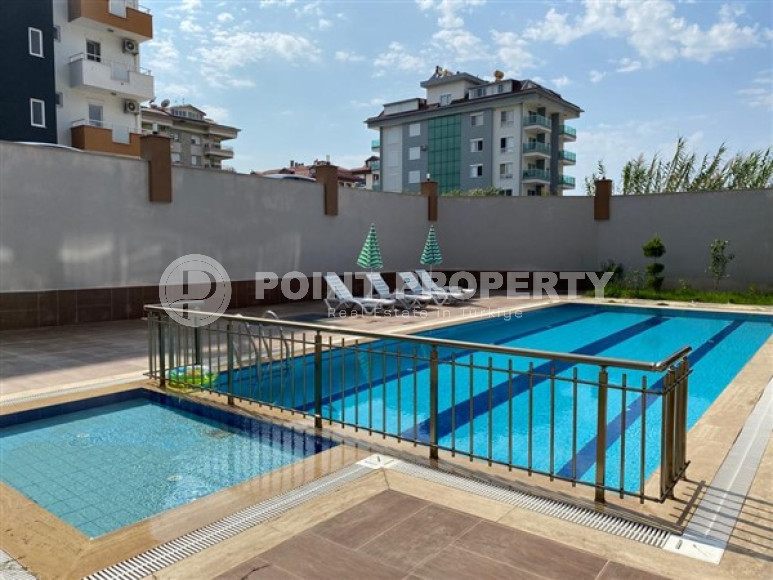 Меблированная двухкомнатная квартира 1+1, в новой резиденции в 250м от моря в районе Кестель, Алания-id-1662-фото-24