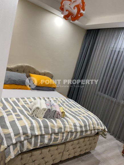 Две квартиры 1+1 на разных этажах в новом доме района Махмутлар-id-8435-фото-10