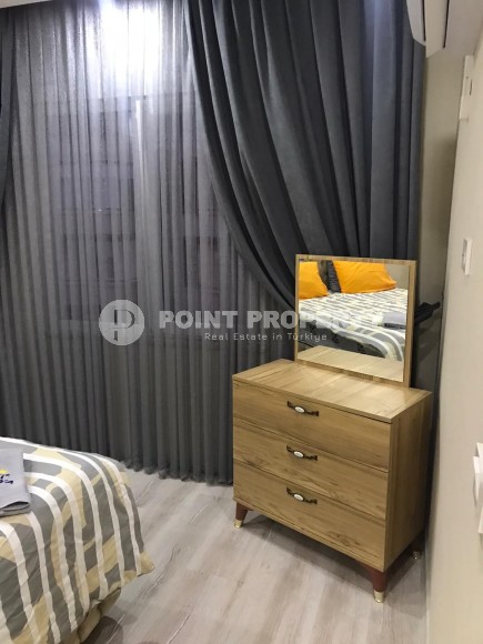 Две квартиры 1+1 на разных этажах в новом доме района Махмутлар-id-8435-фото-11