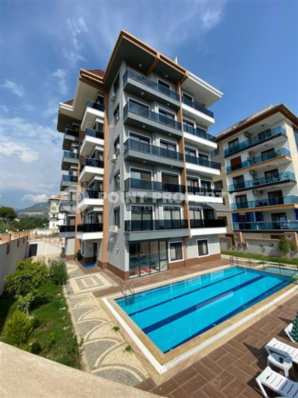 Меблированная двухкомнатная квартира 1+1, в новой резиденции в 250м от моря в районе Кестель, Алания-id-1662-фото-25