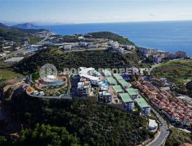 Элитная недвижимость в Алании: шикарная трехэтажная вилла 5+1, 520м², в уникальной резиденции в Конаклы.-id-1663-фото-3