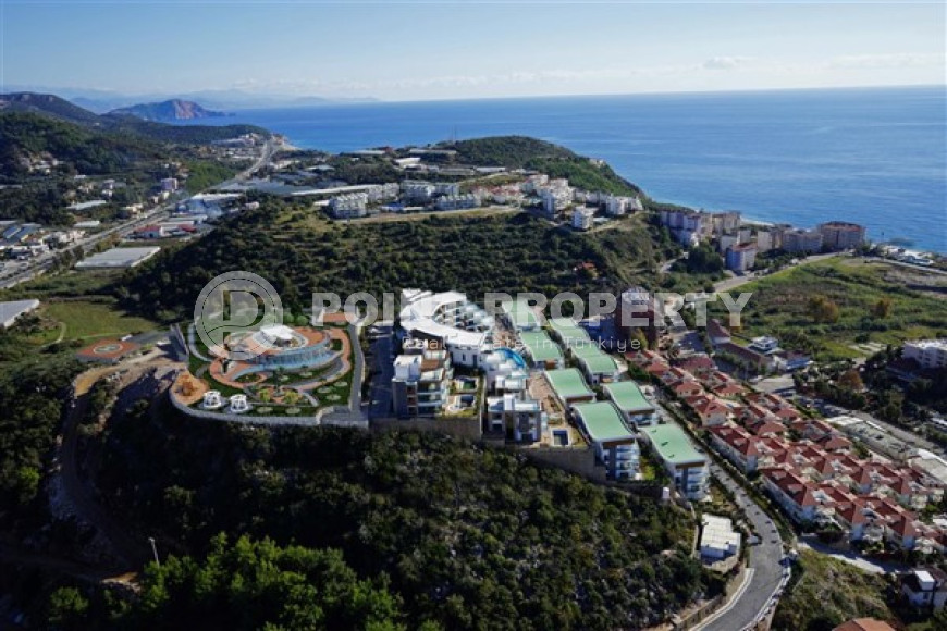 Элитная недвижимость в Алании: шикарная трехэтажная вилла 5+1, 520м², в уникальной резиденции в Конаклы.-id-1663-фото-3