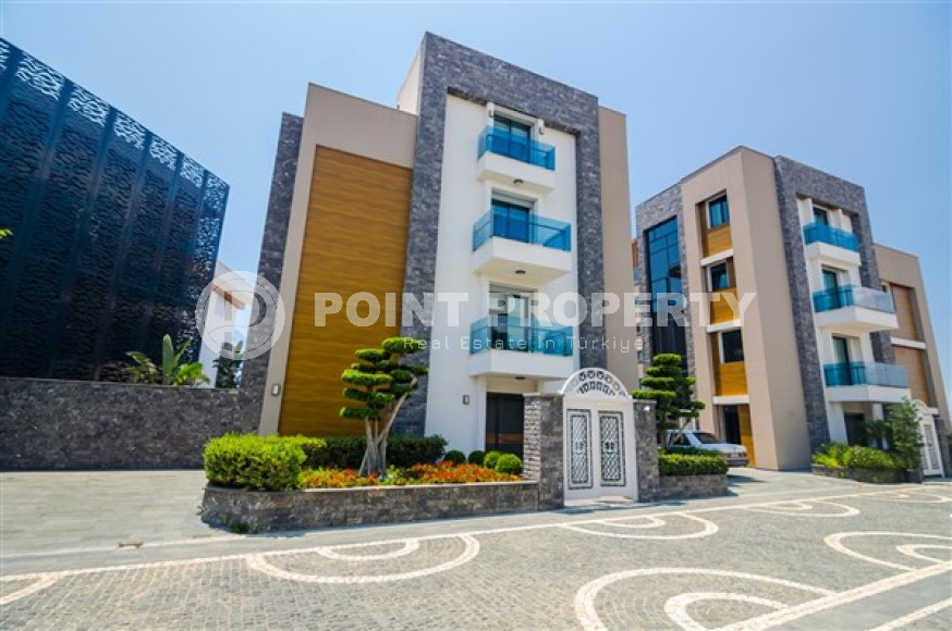 Элитная недвижимость в Алании: шикарная трехэтажная вилла 5+1, 520м², в уникальной резиденции в Конаклы.-id-1663-фото-4