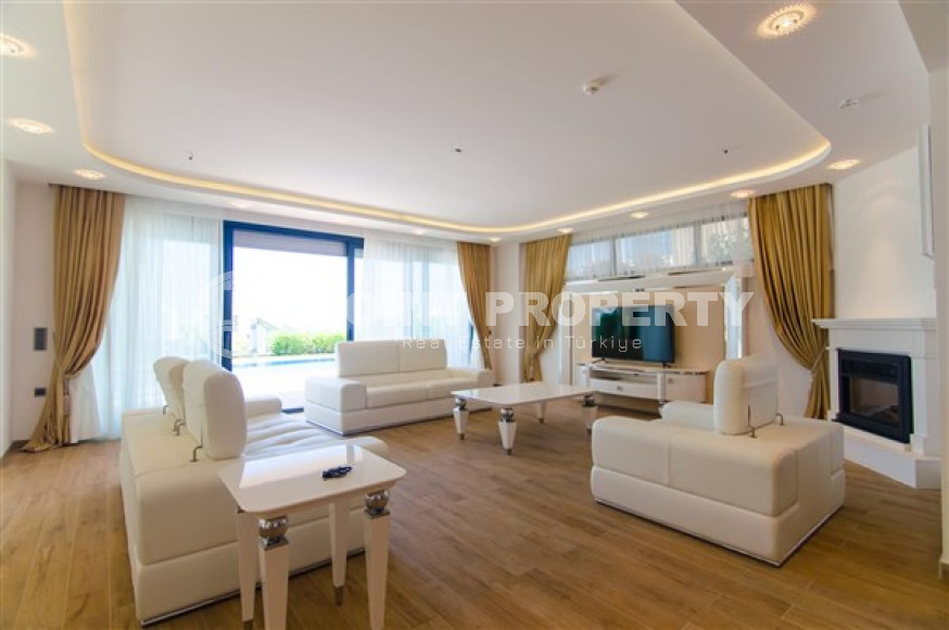 Элитная недвижимость в Алании: шикарная трехэтажная вилла 5+1, 520м², в уникальной резиденции в Конаклы.-id-1663-фото-6