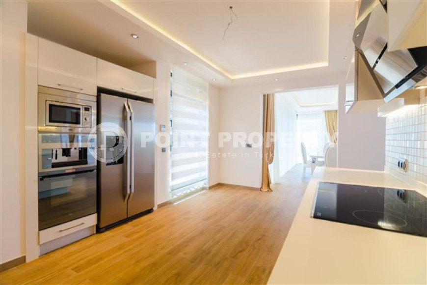 Элитная недвижимость в Алании: шикарная трехэтажная вилла 5+1, 520м², в уникальной резиденции в Конаклы.-id-1663-фото-12