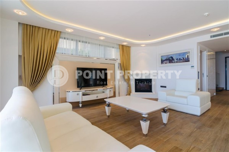 Элитная недвижимость в Алании: шикарная трехэтажная вилла 5+1, 520м², в уникальной резиденции в Конаклы.-id-1663-фото-15