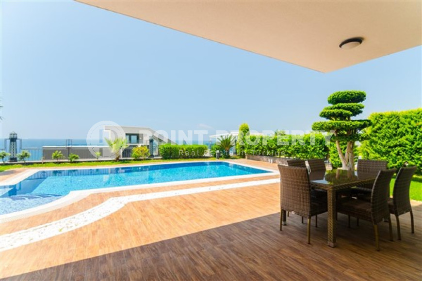 Элитная недвижимость в Алании: шикарная трехэтажная вилла 5+1, 520м², в уникальной резиденции в Конаклы.-id-1663-фото-17