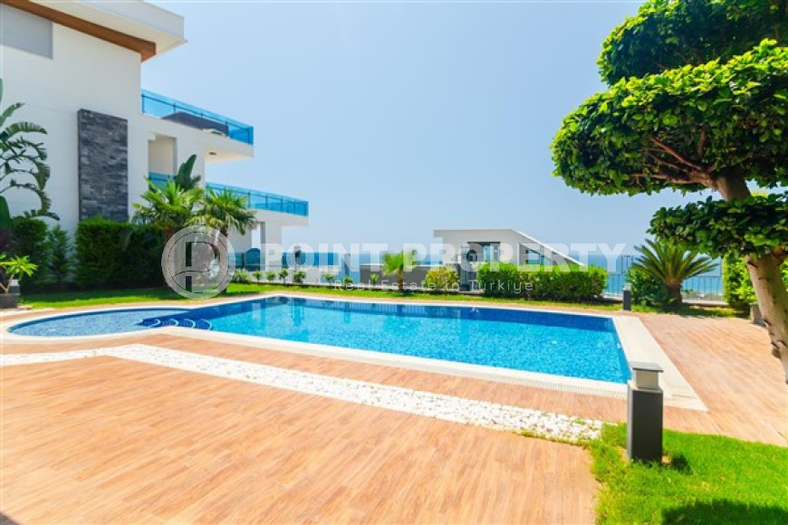 Элитная недвижимость в Алании: шикарная трехэтажная вилла 5+1, 520м², в уникальной резиденции в Конаклы.-id-1663-фото-18