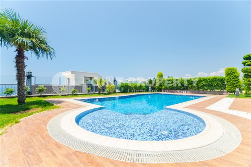 Элитная недвижимость в Алании: шикарная трехэтажная вилла 5+1, 520м², в уникальной резиденции в Конаклы.-id-1663-фото-19