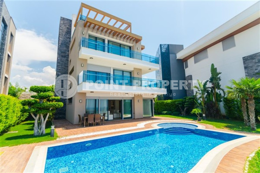 Элитная недвижимость в Алании: шикарная трехэтажная вилла 5+1, 520м², в уникальной резиденции в Конаклы.-id-1663-фото-21