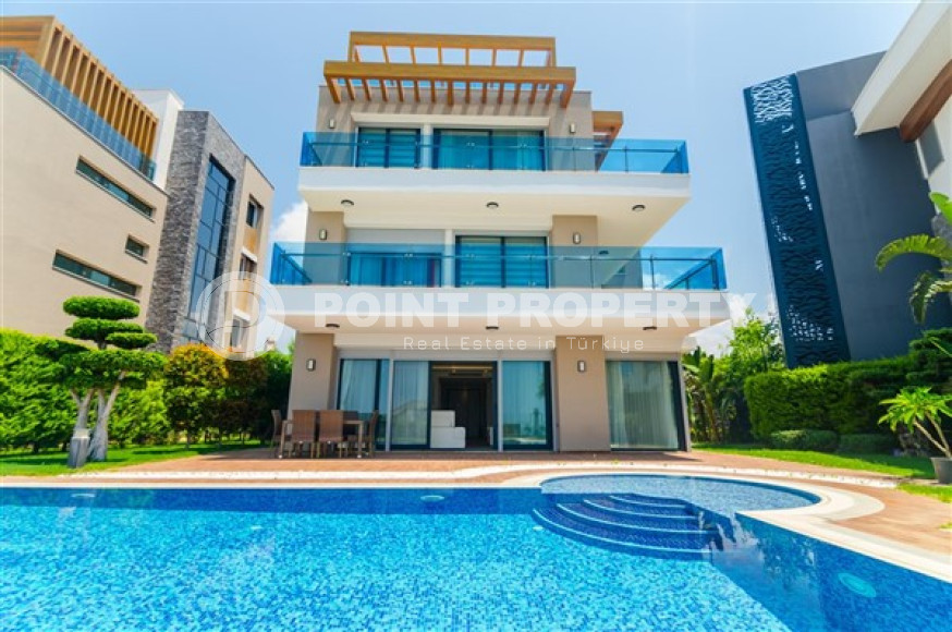 Элитная недвижимость в Алании: шикарная трехэтажная вилла 5+1, 520м², в уникальной резиденции в Конаклы.-id-1663-фото-23