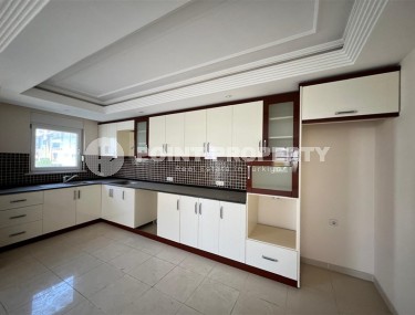 Квартира с двумя спальнями в европейском районе Алании, Оба.-id-8447-фото-5