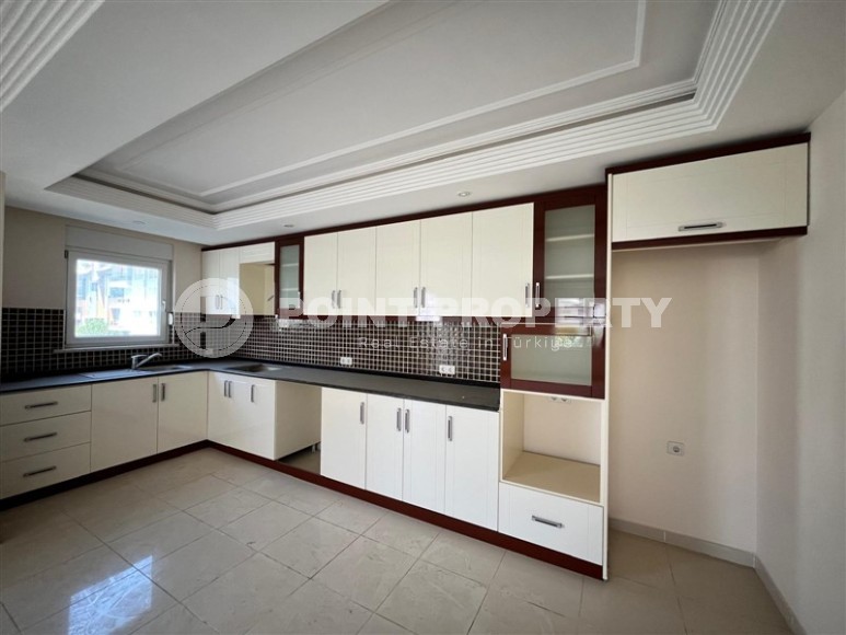 Квартира с двумя спальнями в европейском районе Алании, Оба.-id-8447-фото-5