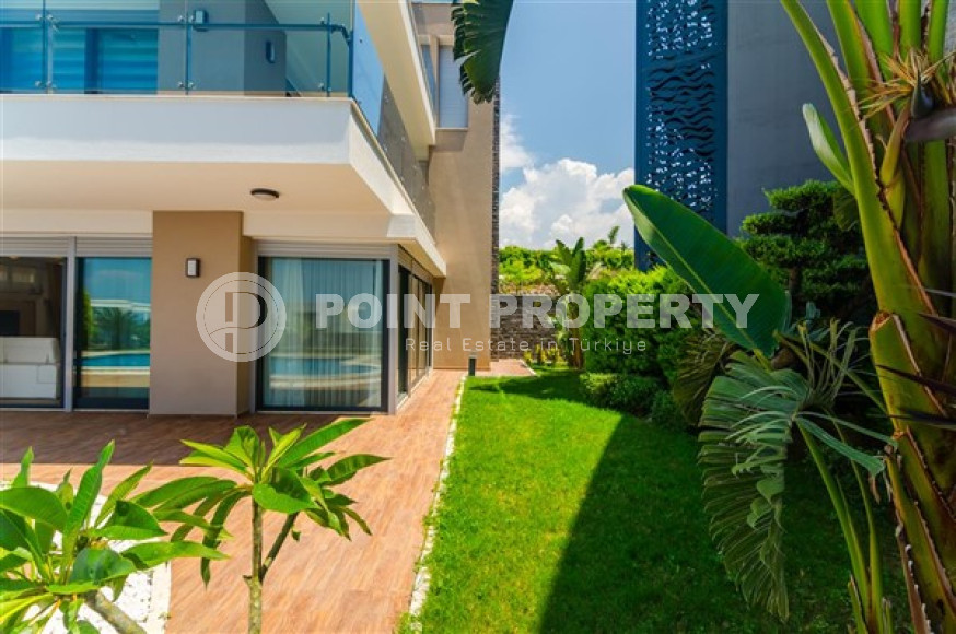 Элитная недвижимость в Алании: шикарная трехэтажная вилла 5+1, 520м², в уникальной резиденции в Конаклы.-id-1663-фото-24