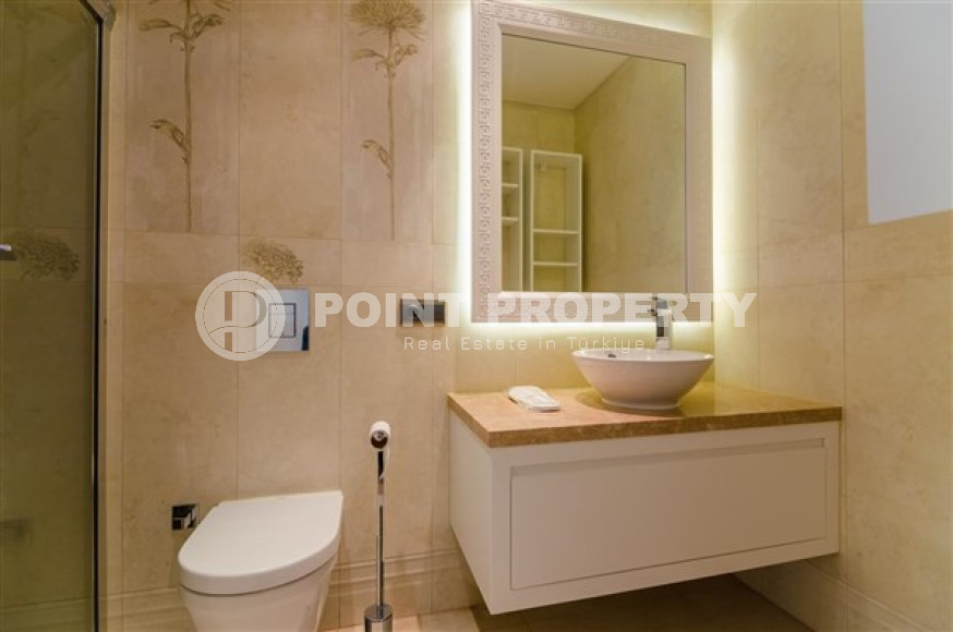 Элитная недвижимость в Алании: шикарная трехэтажная вилла 5+1, 520м², в уникальной резиденции в Конаклы.-id-1663-фото-27