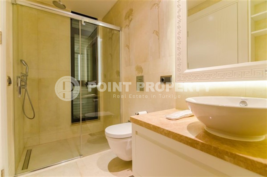 Элитная недвижимость в Алании: шикарная трехэтажная вилла 5+1, 520м², в уникальной резиденции в Конаклы.-id-1663-фото-28