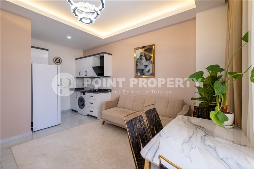 Квартира 1+1 с мебелью по хорошей цене в Махмутларе-id-8450-фото-4