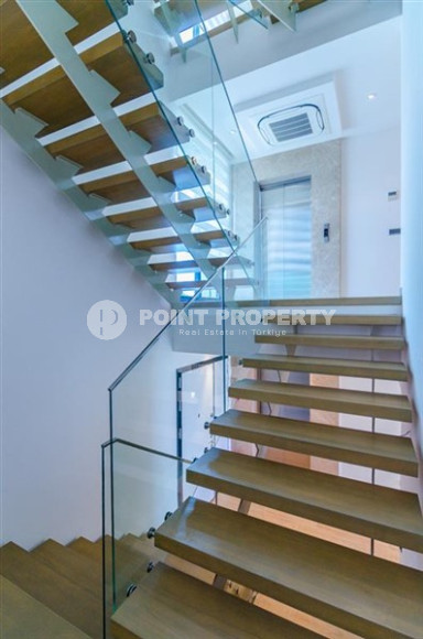 Элитная недвижимость в Алании: шикарная трехэтажная вилла 5+1, 520м², в уникальной резиденции в Конаклы.-id-1663-фото-32