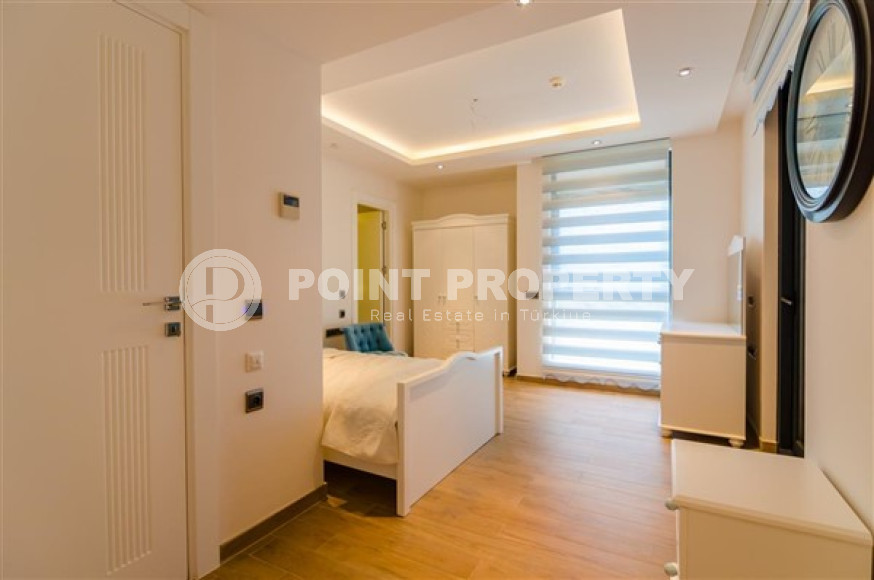 Элитная недвижимость в Алании: шикарная трехэтажная вилла 5+1, 520м², в уникальной резиденции в Конаклы.-id-1663-фото-36