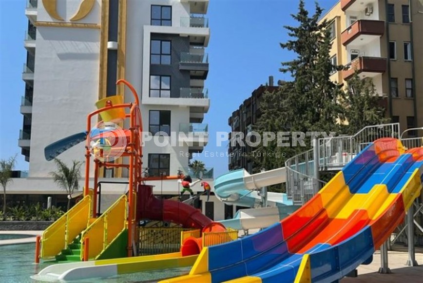 Квартира 1+1 в одном из лучших комплексов Махмутлара-id-8452-фото-15