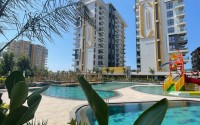 Квартира 1+1 в одном из лучших комплексов Махмутлара-id-8452-фото-16
