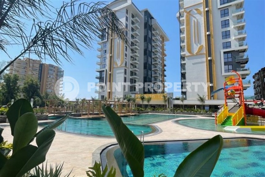 Квартира 1+1 в одном из лучших комплексов Махмутлара-id-8452-фото-16