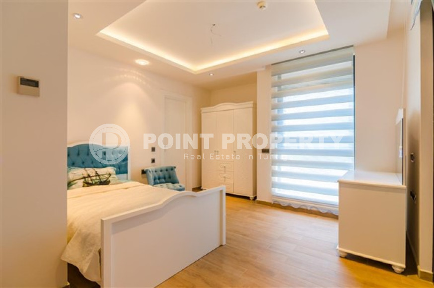 Элитная недвижимость в Алании: шикарная трехэтажная вилла 5+1, 520м², в уникальной резиденции в Конаклы.-id-1663-фото-37