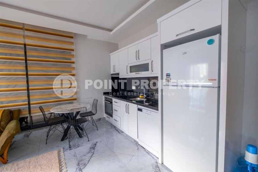 Apartment 1+1 at a good price in Mahmutlar-id-8454-photo-2
