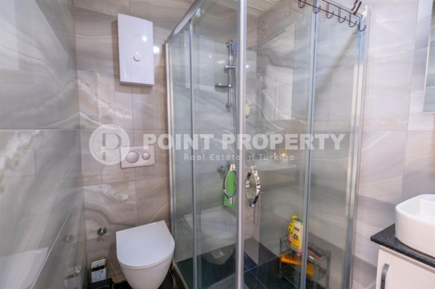 Apartment 1+1 at a good price in Mahmutlar-id-8454-photo-7