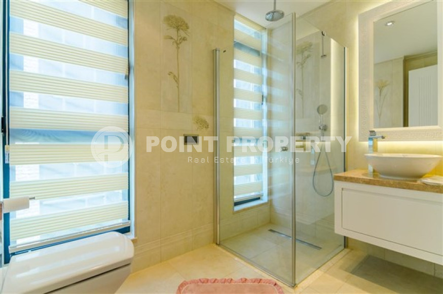 Элитная недвижимость в Алании: шикарная трехэтажная вилла 5+1, 520м², в уникальной резиденции в Конаклы.-id-1663-фото-46