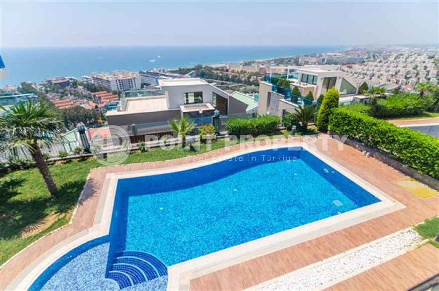 Элитная недвижимость в Алании: шикарная трехэтажная вилла 5+1, 520м², в уникальной резиденции в Конаклы.-id-1663-фото-51