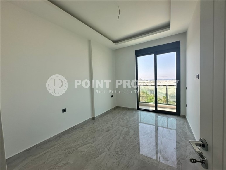 Квартира 1+1 с бытовой техникой в новом комплексе района Демирташ-id-8463-фото-3