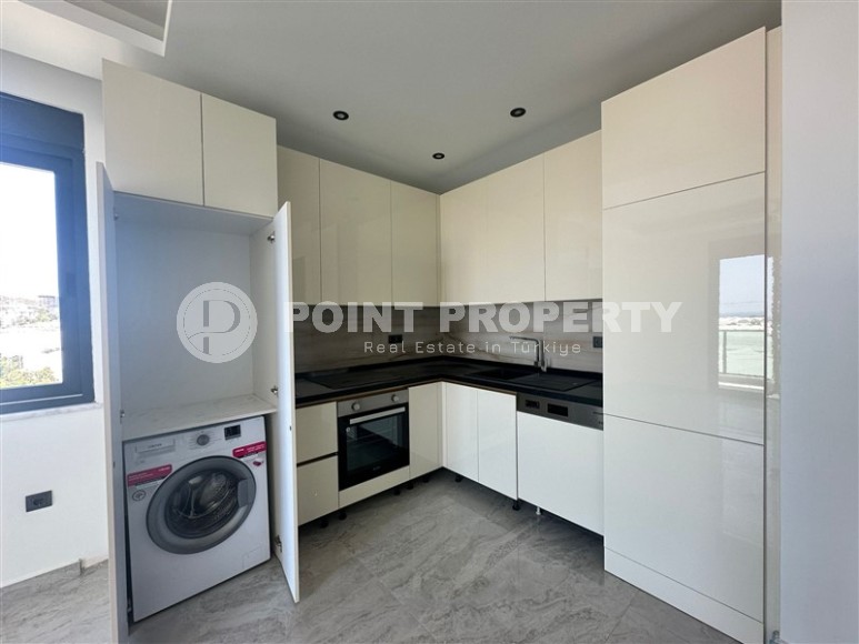 Квартира 1+1 с бытовой техникой в новом комплексе района Демирташ-id-8463-фото-5