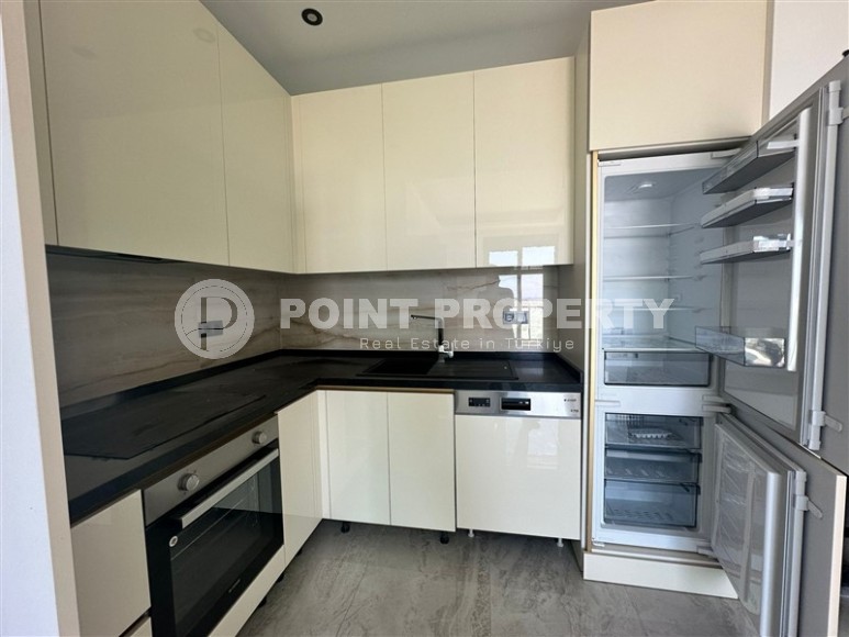 Квартира 1+1 с бытовой техникой в новом комплексе района Демирташ-id-8463-фото-6