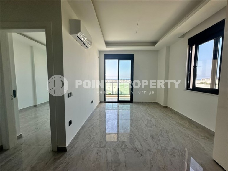 Квартира 1+1 с бытовой техникой в новом комплексе района Демирташ-id-8463-фото-7