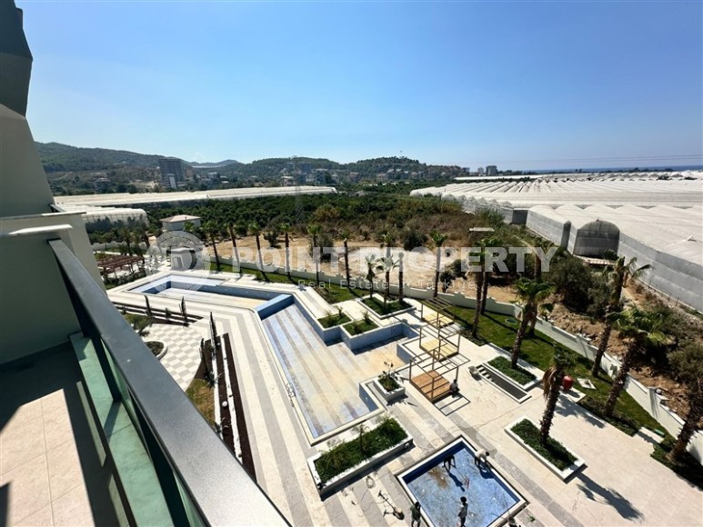 Квартира 1+1 с бытовой техникой в новом комплексе района Демирташ-id-8463-фото-10