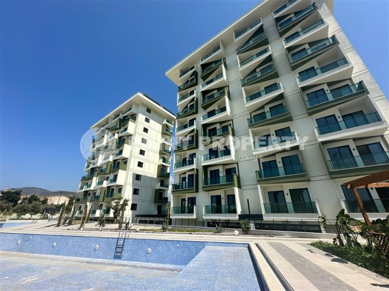 Квартира 1+1 с бытовой техникой в новом комплексе района Демирташ-id-8463-фото-14