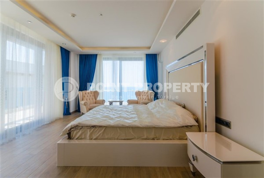 Элитная недвижимость в Алании: шикарная трехэтажная вилла 5+1, 520м², в уникальной резиденции в Конаклы.-id-1663-фото-62