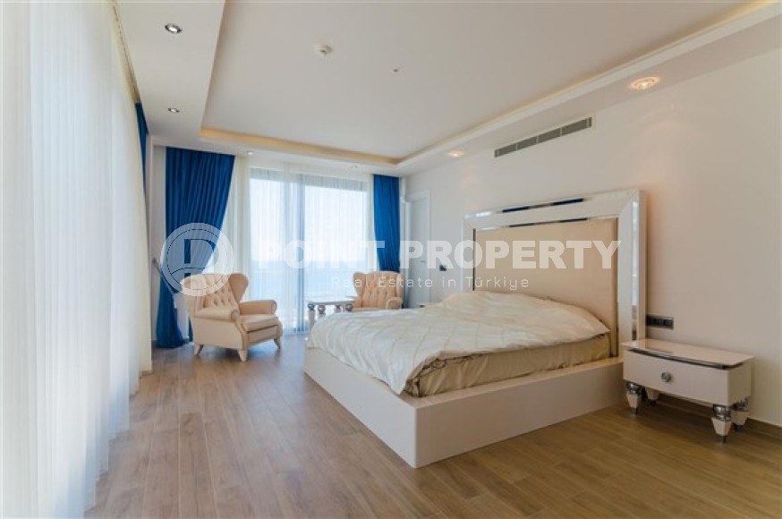 Элитная недвижимость в Алании: шикарная трехэтажная вилла 5+1, 520м², в уникальной резиденции в Конаклы.-id-1663-фото-63