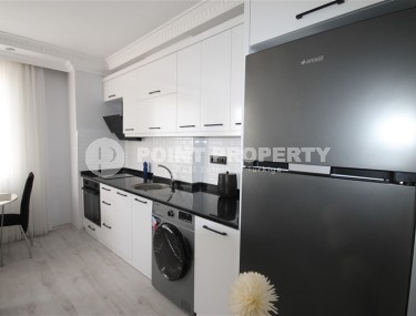 Квартира 1+1 с новой мебелью в центральной части Алании-id-8467-фото-2