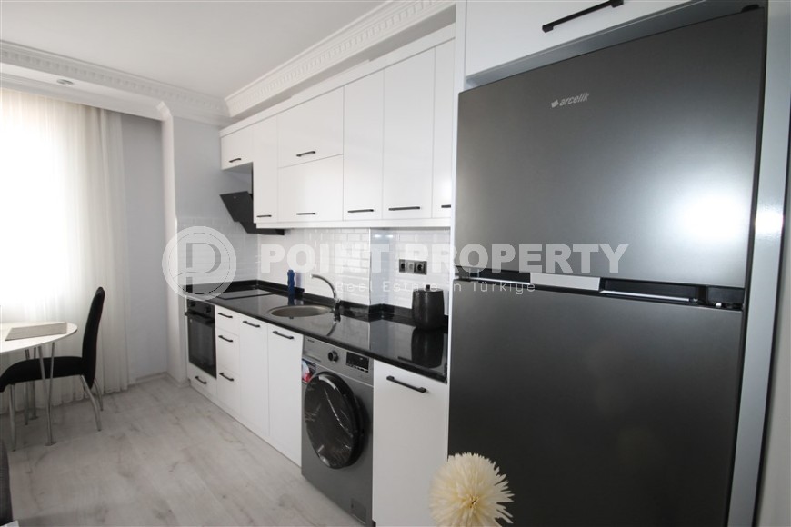 Квартира 1+1 с новой мебелью в центральной части Алании-id-8467-фото-2